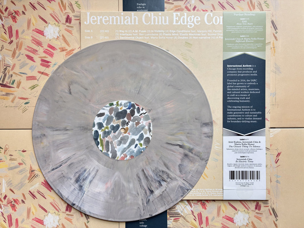 Edge Conditions - Marbled Cream Colored Vinyl
